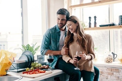 Couple have intimacy in kitchen 